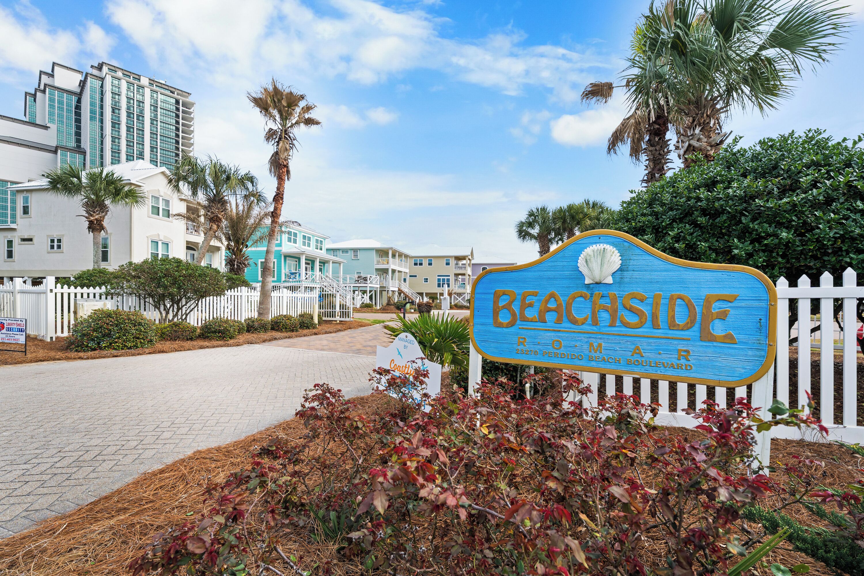 A sign for Beachside Resort, indicating its location on Perdido Beach Boulevard.