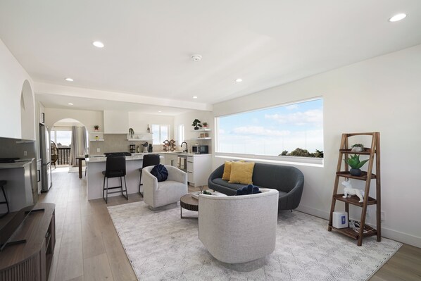 Deluxe House, 3 Bedrooms, Ocean View | Living area | 55-inch flat-screen TV with digital channels - Oceanview Sunset View 3BR Luxe Home Yard (Pacifica)