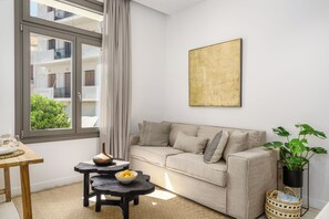 Superior Suite, City View | Living area | 40-inch Smart TV with satellite channels, Netflix, streaming services