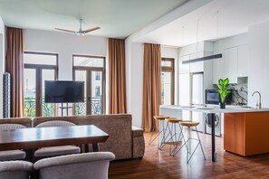 Luxury Apartment, Courtyard View | Living area | Flat-screen TV - Boulevard 115 (Tashkent)