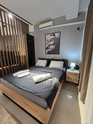 1 habitación, tabla de planchar con plancha, internet y ropa de cama 