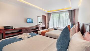 Premium Triple Room with Balcony, Pool View | Minibar, in-room safe, desk, laptop workspace