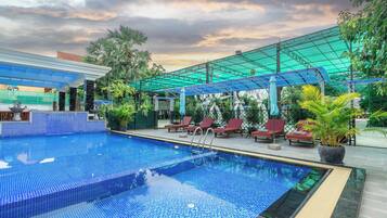 2 indoor pools, 2 outdoor pools, open 6:30 AM to 9:00 PM, pool umbrellas