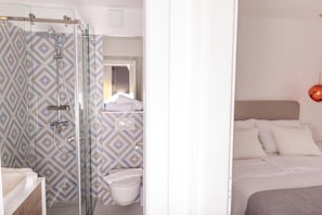 Shower, towels, soap, toilet paper