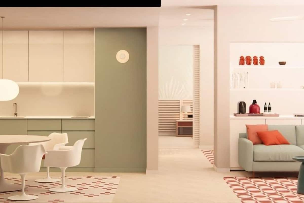A modern interior with a kitchen, dining area, and living space.