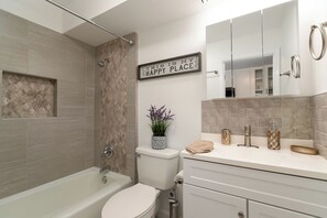 Hair dryer, towels, soap, toilet paper