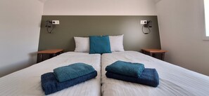 1 slaapkamer, een strijkplank/strijkijzer, reisbedje, gratis wifi