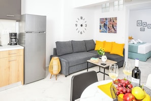 Athinais Suites A4 | Living area | 45-inch Smart TV with cable channels