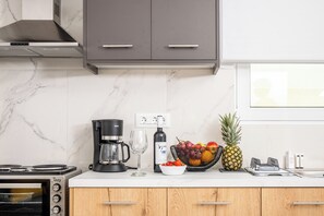 Athinais Suites A3 | Private kitchen | Full-size fridge, oven, stovetop, coffee/tea maker