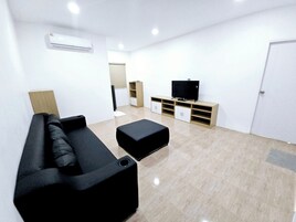 Suite | Living area | 32-inch LCD TV with cable channels