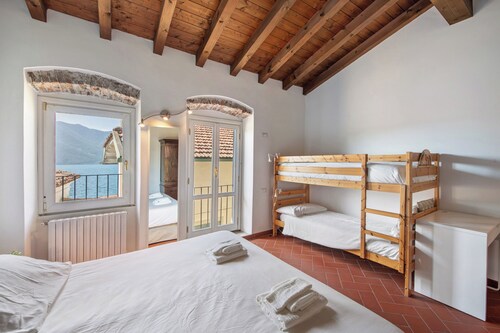 Appartement « Il Giardino Segreto » avec vue sur le lac, terrasse privée et Wi-Fi