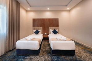Suite familiar | Sábanas de algodón egipcio, ropa de cama de alta calidad, minibar