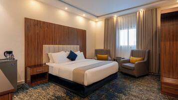 Kamar Deluks | Seprai katun Mesir, seprai premium, minibar, dan kedap suara