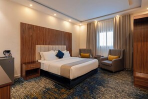 ห้องดีลักซ์ | ผ้าปูที่นอนฝ้ายอียิปต์, เครื่องนอนระดับพรีเมียม, มินิบาร์, ห้องเก็บเสียง