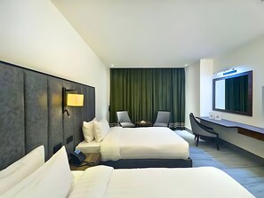 Kamar Triple Eksekutif | Seprai premium, Wi-Fi gratis, dan seprai linen