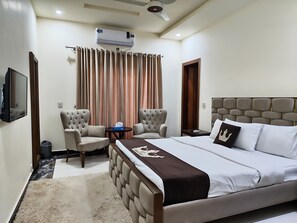 Habitación Deluxe | Ropa de cama de alta calidad, wifi gratis y ropa de cama 
