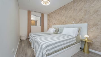1 dormitorio, tabla de planchar con plancha, wifi gratis y ropa de cama