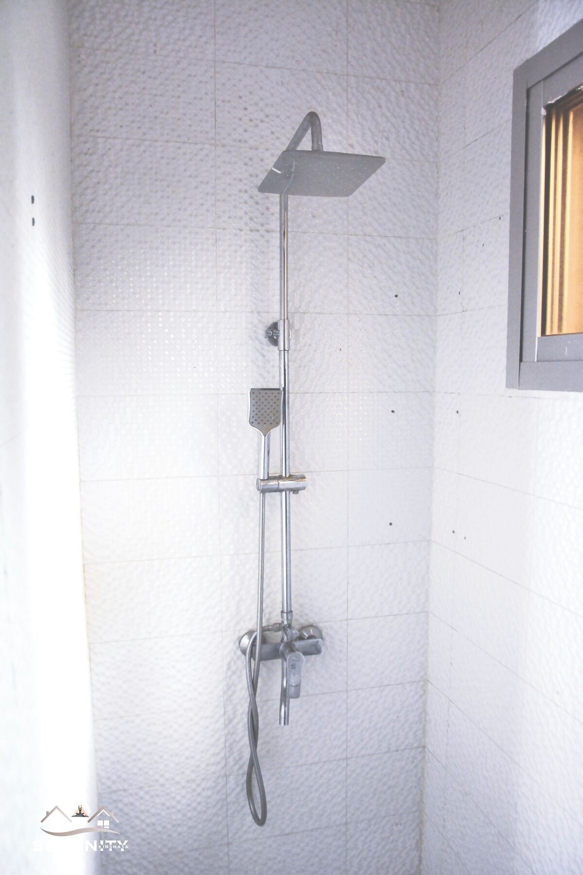 Shower, towels, soap, toilet paper