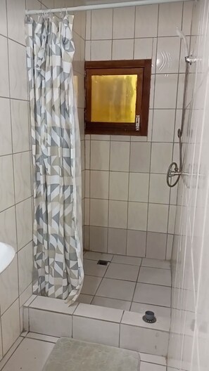 Economy Double Room, City View | Bathroom | Shower, free toiletries, towels, soap