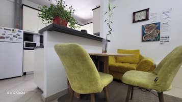 Apartment, Multiple Bedrooms, City View | Living area