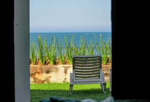 Premium kamer, uitzicht op zee, uitzicht op zee | Woonruimte | Ledtelevisie