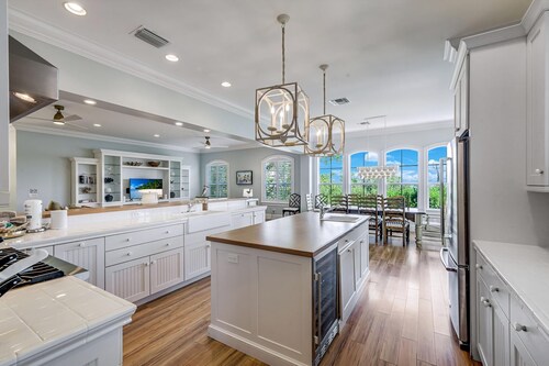Stunning bayside retreat with golf cart!