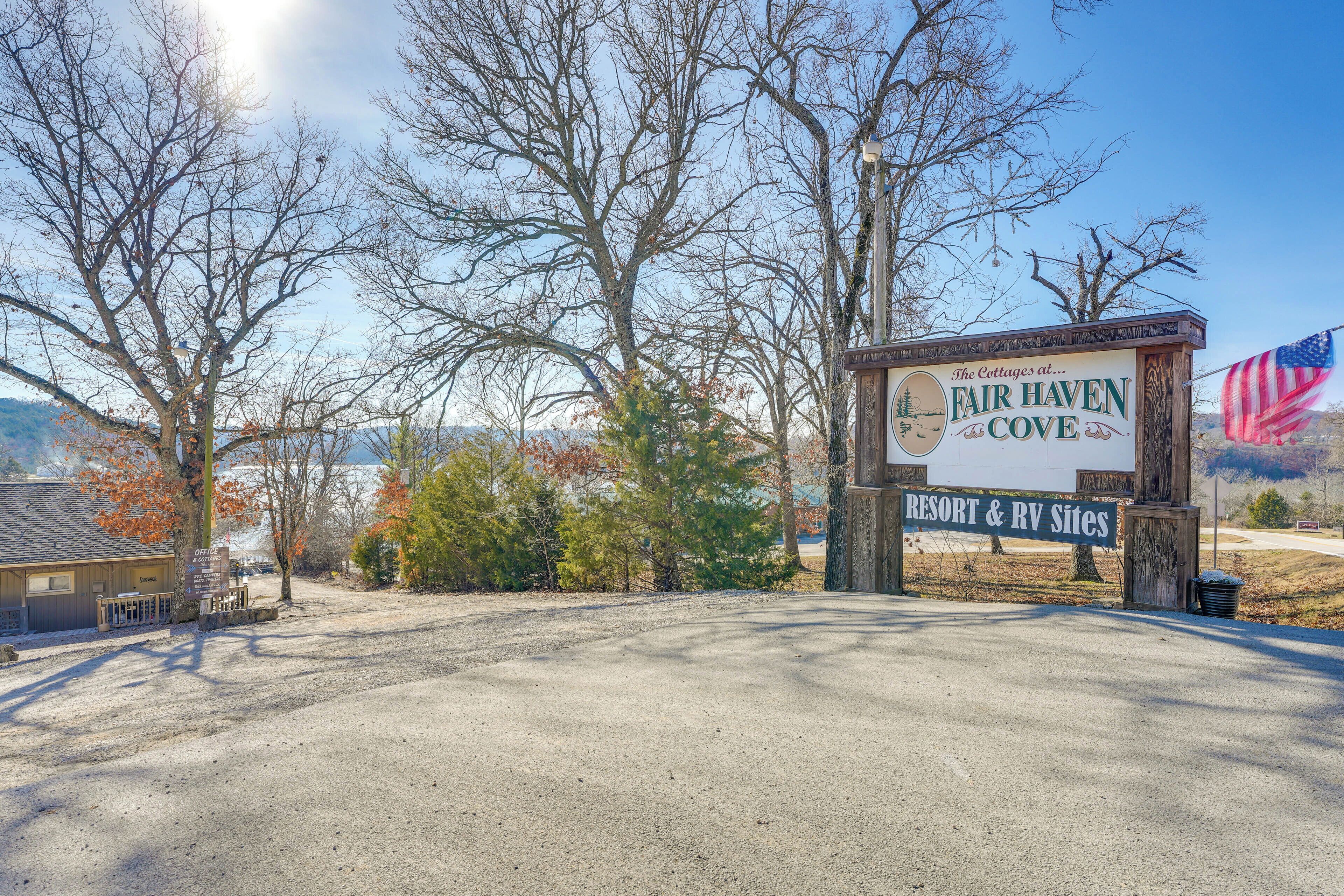 A sign for Fair Haven Cove Resort & RV Sites with a clear view of the surrounding area.