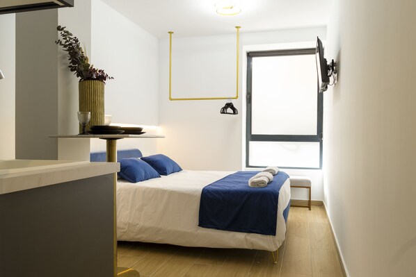 1 slaapkamer, een strijkplank/strijkijzer, wifi, beddengoed