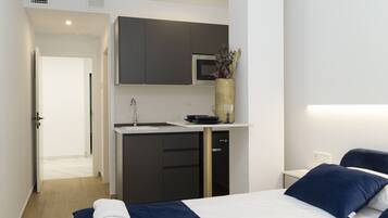 1 slaapkamer, een strijkplank/strijkijzer, wifi, beddengoed