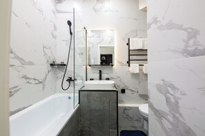Hair dryer, towels, soap, shampoo