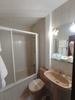 Standard Double or Twin Room | Bathroom | Hair dryer, towels, soap, shampoo