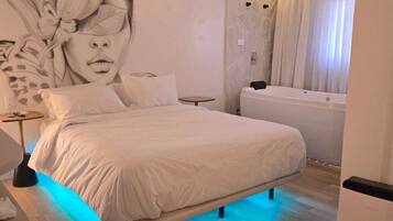 Suíte premium, no piso térreo | 1 quarto, roupas de cama premium, camas Select Comfort