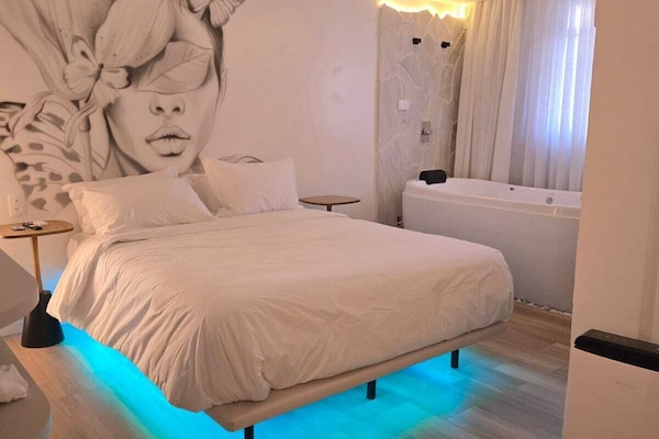 Suíte premium, no piso térreo | 1 quarto, roupas de cama premium, camas Select Comfort