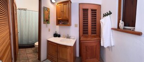 Shower, hair dryer, towels, soap