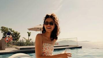 5 outdoor pools, open 6:00 AM to 8:00 PM, pool umbrellas, pool loungers