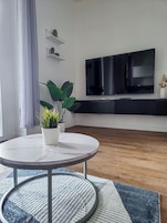 Superior Apartment, Balcony | Living area | Flat-screen TV