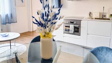Superior Apartment, Private Bathroom | Living area | Flat-screen TV