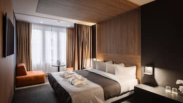 Minibar, coffres-forts dans les chambres, rideaux occultants