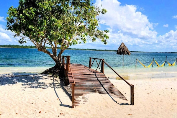 Playa privada, playa de arena blanca y traslado desde/hacia la playa