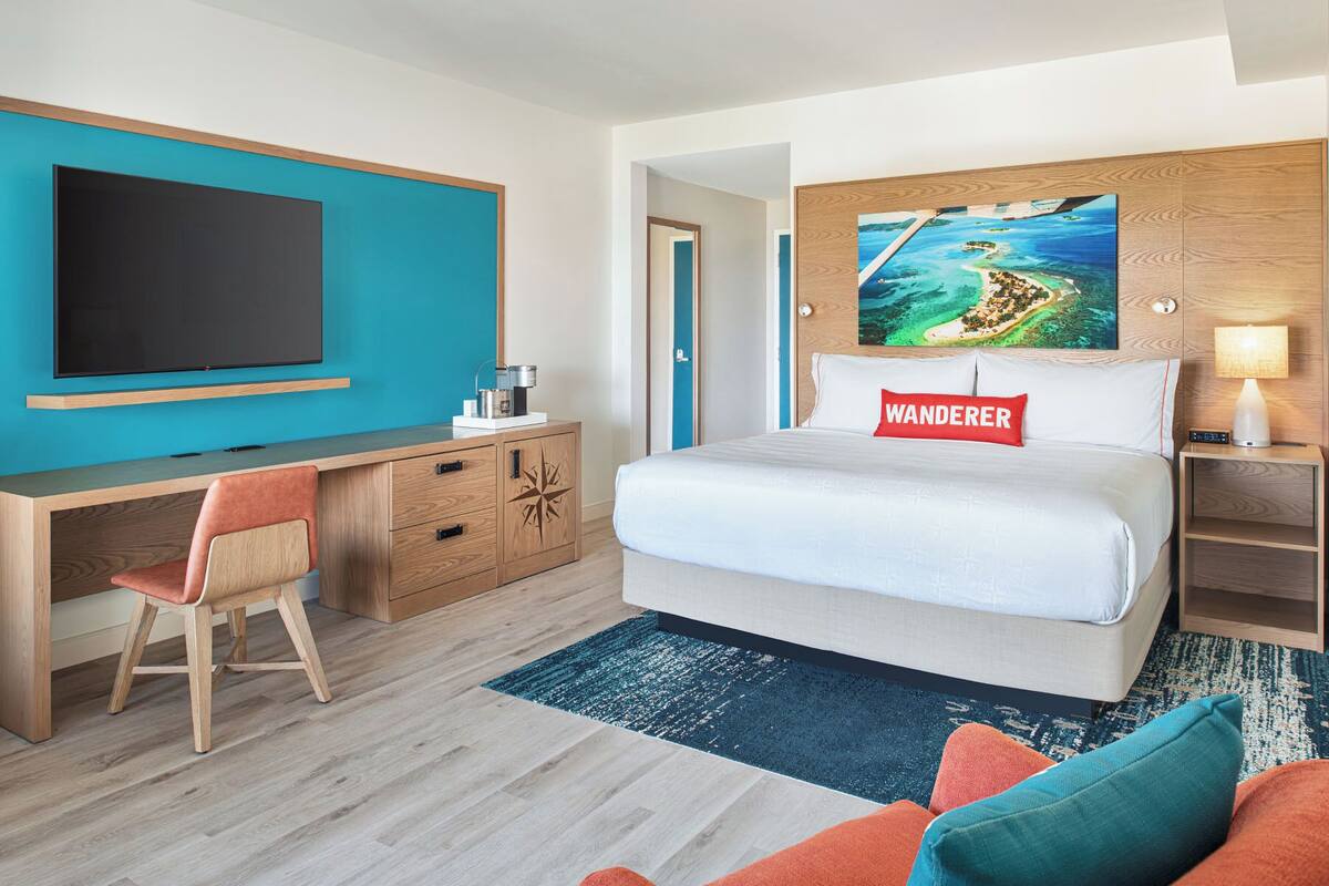 Deluxe Room, 1 King Bed, Balcony, Ocean View | 1 bedroom, iron/ironing board, free WiFi, bed sheets