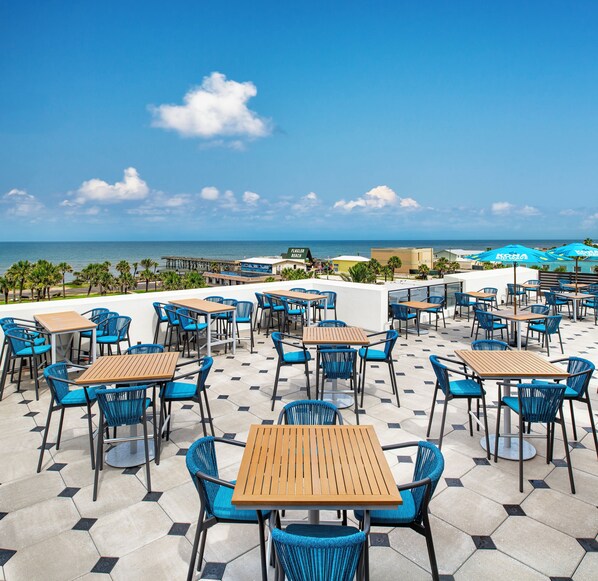Rooftop bar, beach views, open daily