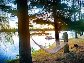 Property grounds - Beautiful Lakefront cabin w/woodburning fireplace, parking, grill, canoe, SUP. (Wautoma)