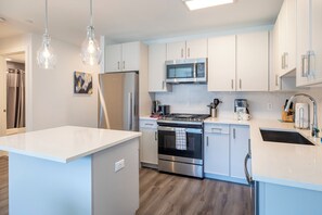 Deluxe Apartment, Kitchen, Courtyard View | Private kitchen - Atlantic Station West - 8T (Stamford)