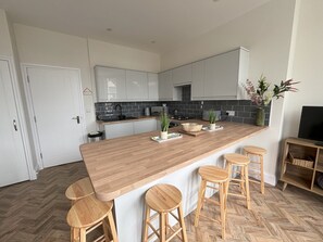 Fridge, microwave, oven, coffee/tea maker - Hollywell Stays, Sea View is situated in Meads Village close to the South Downs (Eastbourne)