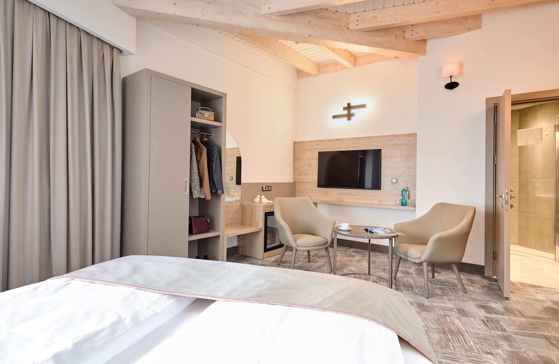 Luxe beddengoed, donsdekens, een minibar, een kluis op de kamer