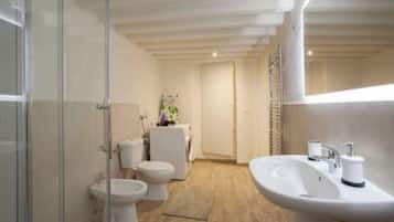 Shower, eco-friendly toiletries, hair dryer, towels