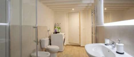 Shower, eco-friendly toiletries, hair dryer, bidet
