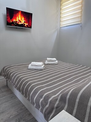 1 chambre, fer et planche à repasser, Wi-Fi, draps fournis
