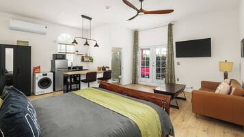 1 bedroom, desk, iron/ironing board, travel crib