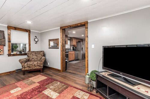 This house is a cozy escape in the rural neighborhood of Leadmine Wisconsin. 